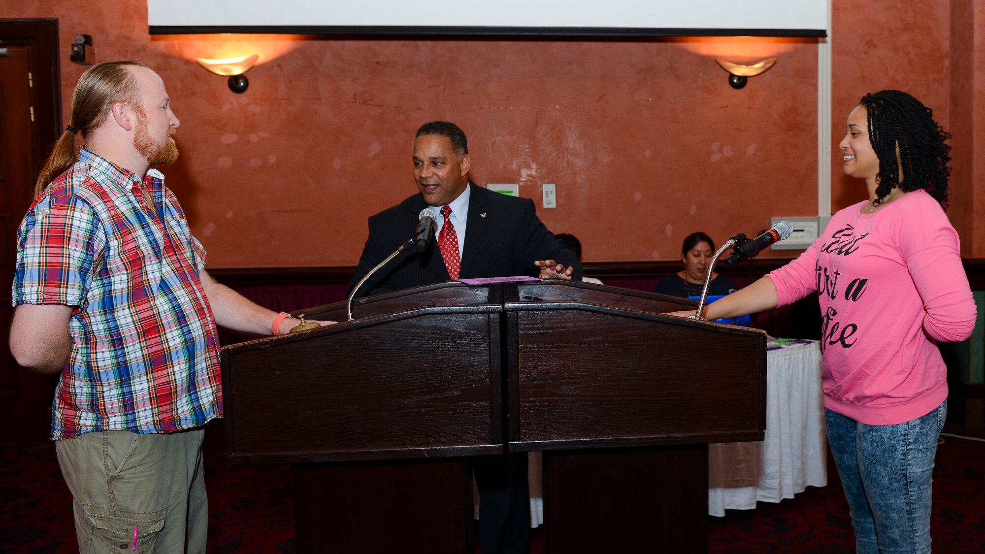 Jeff Mochko, 31st Medical Group spouse, John Duarte, 31st Force Support Squadron key spouse, and Marqeitta Playfair, 31st Fighter Wing staff agencies spouse, participate in a “Spouse It Up: Family Feud” competition, June 2, 2016, at Aviano Air Base, Italy. Attendees created arts and crafts in an activity workshop, listened to a resiliency speech, paired wine and participated in a quality-of-life seminar before the game. (U.S. Air Force photo by Senior Airman Austin Harvill/Released)