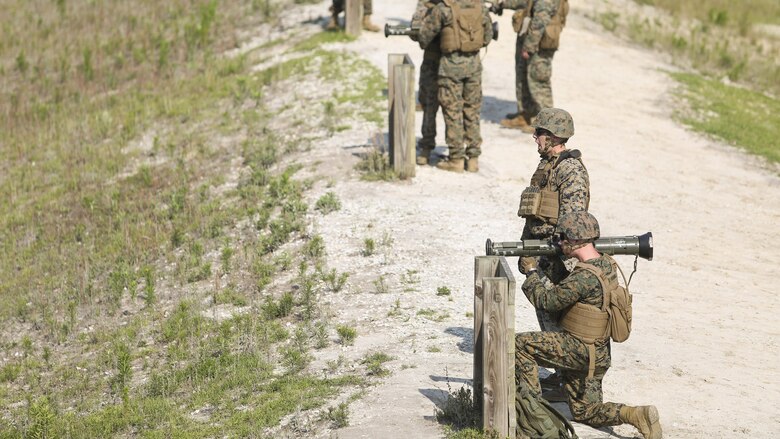 Marines with Bravo Company, 2nd Law Enforcement Battalion prepare to fire tracer rounds from AT-4 rocket launchers at Marine Corps Base, Camp Lejeune, N.C. June 3, 2016. The unit took to the firing line to broaden their mission capabilities and prepare for real world scenarios. 
