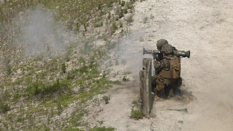 Marines with Bravo Company, 2nd Law Enforcement Battalion prepare to fire tracer rounds from AT-4 rocket launchers at Marine Corps Base, Camp Lejeune, N.C. June 3, 2016. The unit took to the firing line to broaden their mission capabilities and prepare for real world scenarios. 