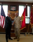 Peter Hultqvist, Sweden's Minister of Defense (left), is greeted by Lt. Gen. John E. Wissler, commanding general of U.S. Marine Forces Command, during his visit to MARFORCOM in Norfolk, Virginia, June 6. (Official U.S. Marine Corps Photo by Cpl. Calvin Shamoon/ Released)