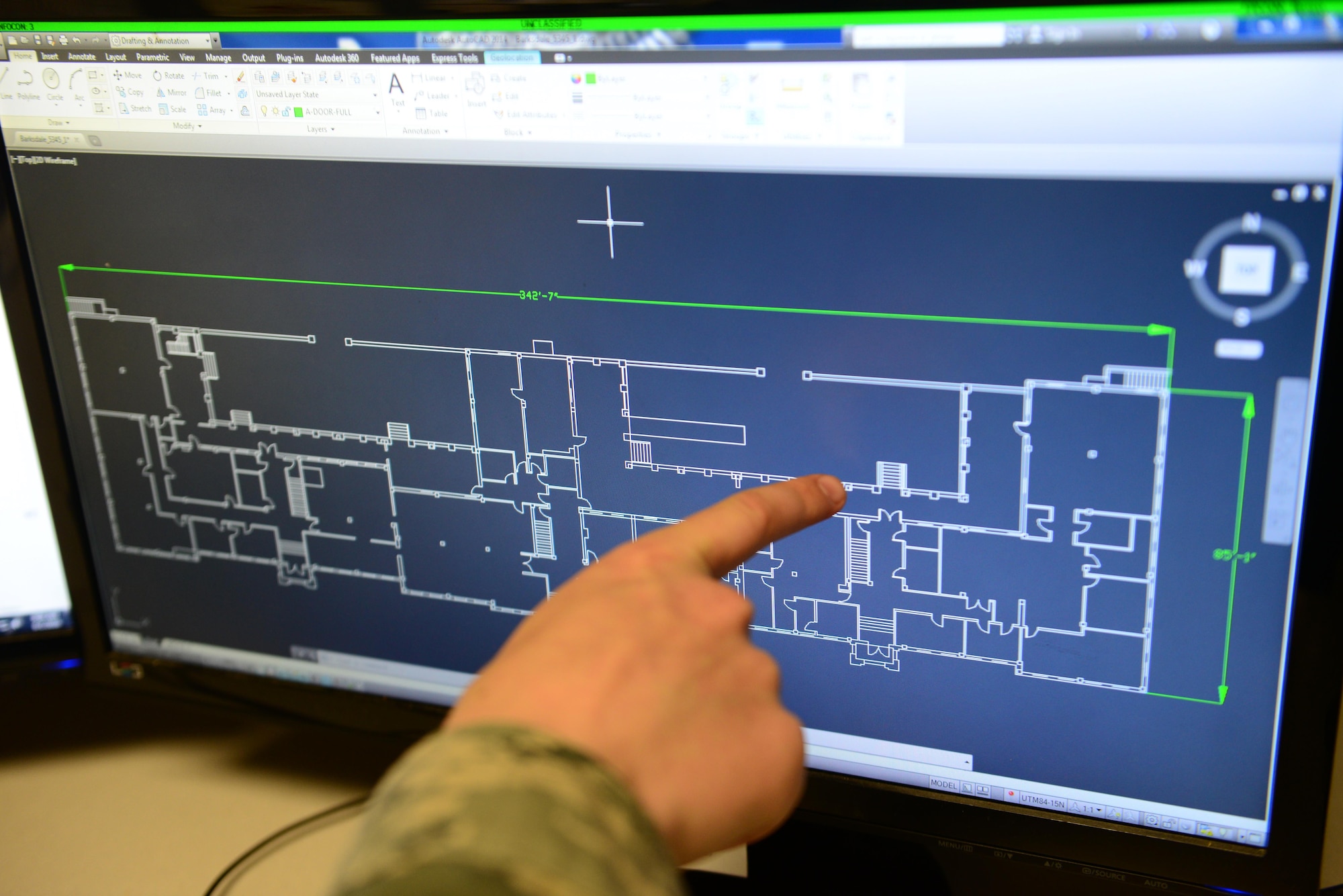 Airman 1st Class David Young, 2nd Civil Engineer Squadron engineering apprentice, examines a computer animated drawing at Barksdale Air Force Base, La., June 1, 2016. The 2nd CES Airmen update and maintain all base maps and utility maps. (U.S. Air Force photo/Senior Airman Luke Hill)