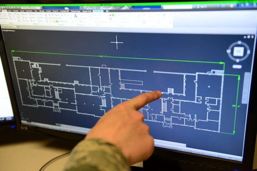 Airman 1st Class David Young, 2nd Civil Engineer Squadron engineering apprentice, examines a computer animated drawing at Barksdale Air Force Base, La., June 1, 2016. The 2nd CES Airmen update and maintain all base maps and utility maps. (U.S. Air Force photo/Senior Airman Luke Hill)