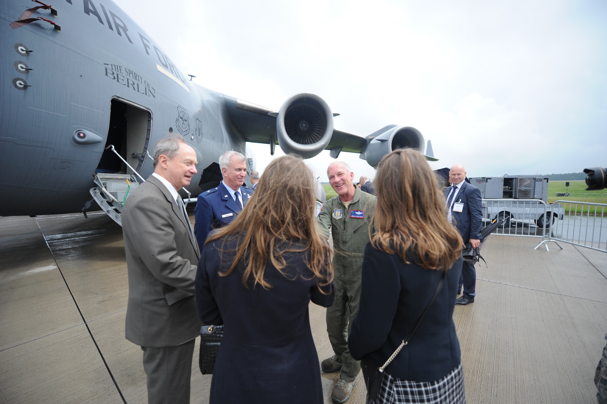 Lt. Col. Craig Bartosh, 701st Airlift Squadron aircraft commander, meets with John B. Emerson, United States Ambassador to Germany, along with his family June 1, 2016, during the 2016 Berlin Air Show. Bartosh, along with the Charleston air crew, gave the ambassador a tour throughout the C-17 Globemaster III entitled, “The Spirit of Berlin.” Emerson was confirmed by the United States Senate on August 1, 2013 as U.S. Ambassador to the Federal Republic of Germany and presented his credentials to German President Joachim Gauck on August 26, 2013.  (U.S. Air Force photo by Senior Airman Tom Brading)