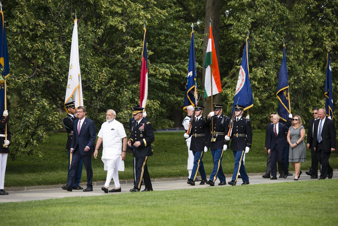 Defense Secretary Ash Carter, left, Indian Prime Minister Narendra Modi and Army Maj. Gen. Bradley A. Becker walk toward the Tomb of the Unknown Soldier at Arlington National Cemetery, Va., June 6, 2016. Army photo by Rachel Larue

