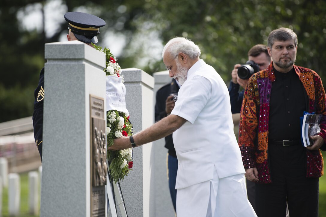 Indian Prime Minister Narendra Modi lays a wreath at the Space Shuttle Columbia Memorial at Arlington National Cemetery, Va., June 6, 2016. Army photo by Rachel Larue