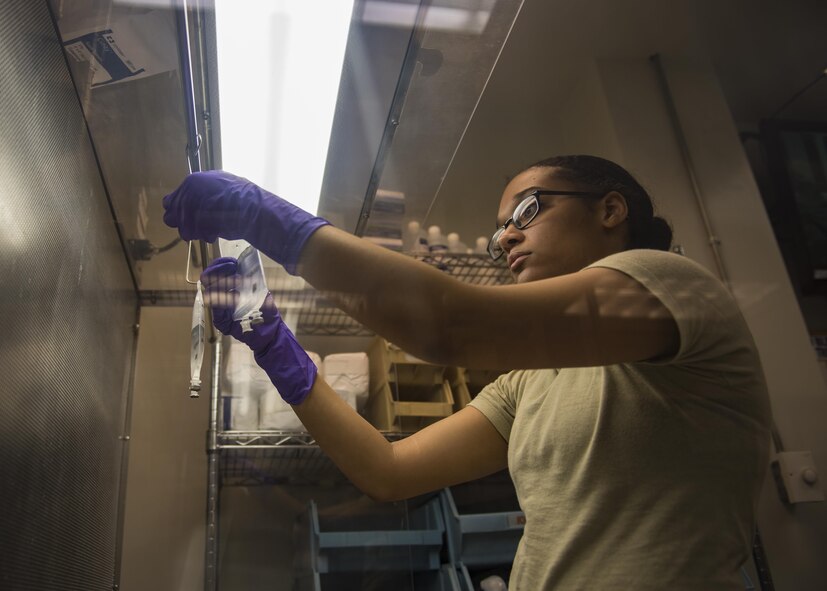Senior Airman Latoya Kirven, 455th Expeditionary Medical Group pharmacy technician, makes an intravenous(IV) medication for patients within the Craig Joint Theater Hospital at Bagram Airfield, Afghanistan, June 06, 2016. Pharmacists and pharmacy technicians compound medications, fill prescriptions, and provide feedback to doctors on what medications are best suited for patients. (U.S. Air Force photo by Senior Airman Justyn M. Freeman)
