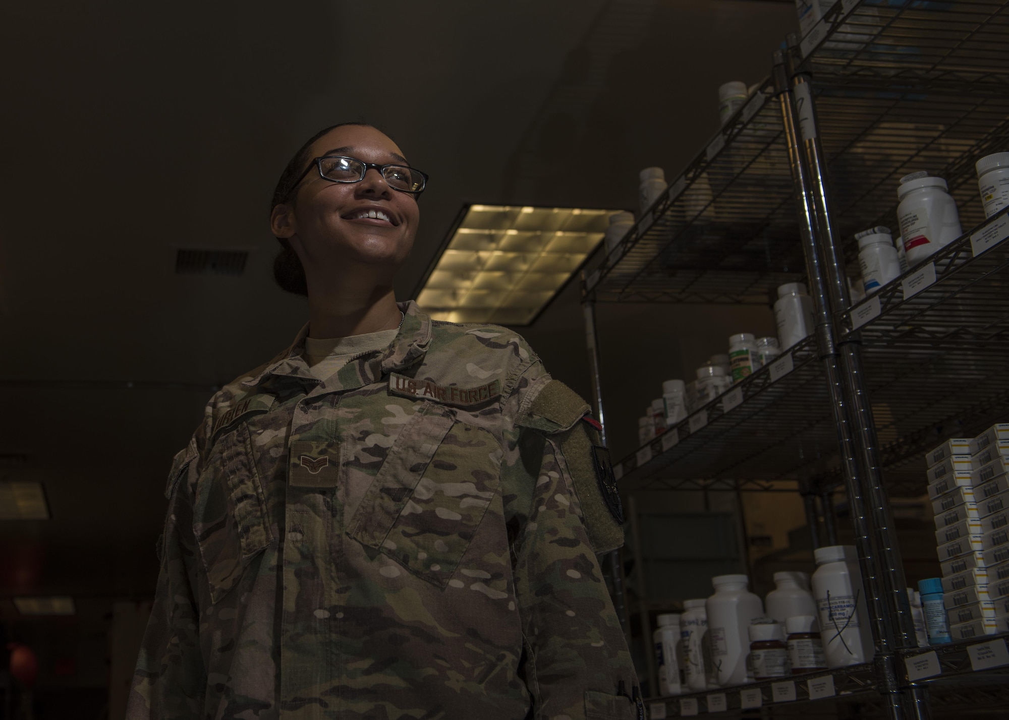 Senior Airman Latoya Kirven, 455th Expeditionary Medical Group pharmacy technician, poses for a portrait at the Craig Joint-Theater Hospital, Bagram Airfield, Afghanistan, June 06, 2016. Airmen of the 455th EMDG pharmacy have made 621 IVs, filled 1,487 prescriptions, and compounded 9,119 doses for patients within the past month. (U.S. Air Force photo by Senior Airman Justyn M. Freeman