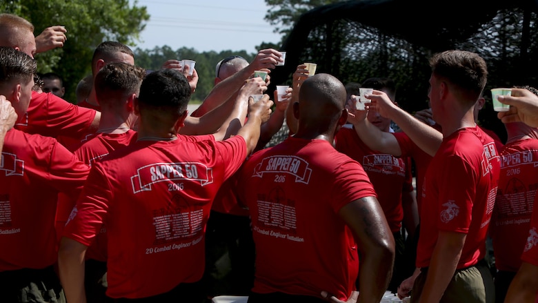 Maj. Gen. Brian Beadreault, 2nd Marine Division Commanding General, leads Marines with 2nd Combat Engineer Battalion in a toast during a “Sapper 50” memorial run honoring fallen Marines of 2nd Combat Engineer Battalion at Marine Corps Base Camp Lejeune, North Carolina, June 4, 2016. Each group of 29 Marines carrying the dog tags of the fallen ran 5 miles of the 50 miles in total, but all the Marines, friends and family in attendance walked the last mile together.