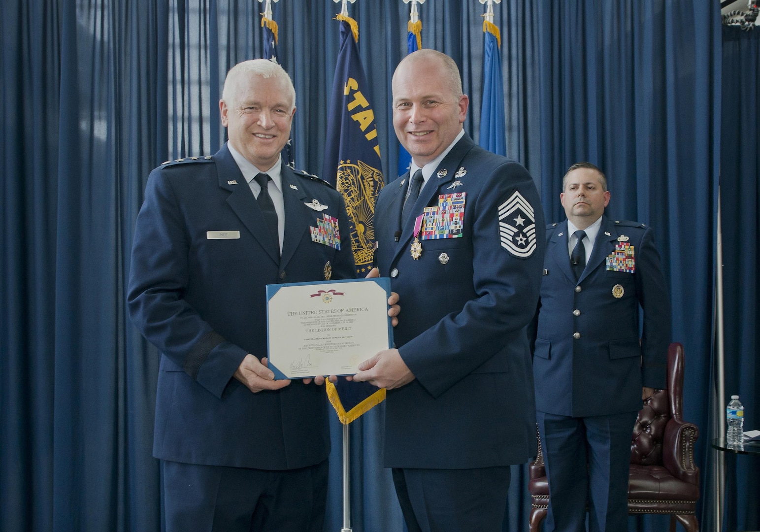 Lt. Gen. L. Scott Rice, director of the Air National Guard, presents Chief Master Sgt. James W. Hotaling, the 11th command chief master sergeant of the ANG, with the Legion of Merit during his retirement ceremony May 20, 2016, at Joint Base Andrews, Md. Hotaling retired after serving a combined 28 years in the Air Force, Air Force Reserve, Air National Guard, and U.S. Coast Guard.