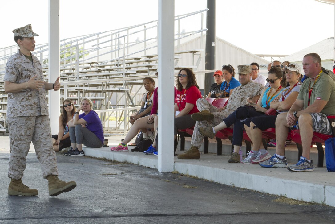 Col. Julie L. Nethercot speaks with approximately 40 educators from states east of the Mississippi River at the Officer Candidates School parade deck aboard Marine Corps Base Quantico, Va., June 7 for the 2016 Key Leaders and Educators Workshop. The week-long workshop creates a mutually beneficial relationship between educators and the Marine Corps where key leaders and educators can share knowledge about the Corps with America’s leaders of tomorrow. Nethercot is the commanding officer of OCS.