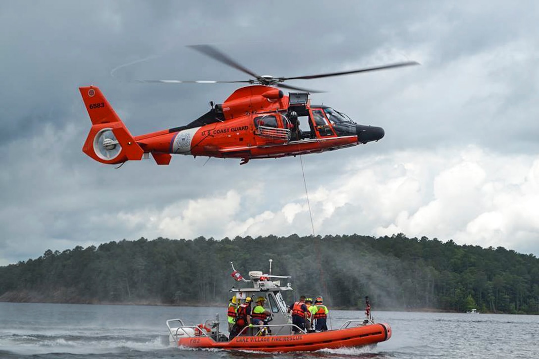 U.S. Coast Guard Sector Lower Mississippi participates in the annual fire boat school at DeGray Lake Resort State Park, Ark., June 6, 2016. More than 30 fireboat crews representing 20 counties across Arkansas, Texas, and Missouri conducted different scenarios and exercises, including plane crashes and defensive boat operations.  Coast Guard photo by Lexie Preston
