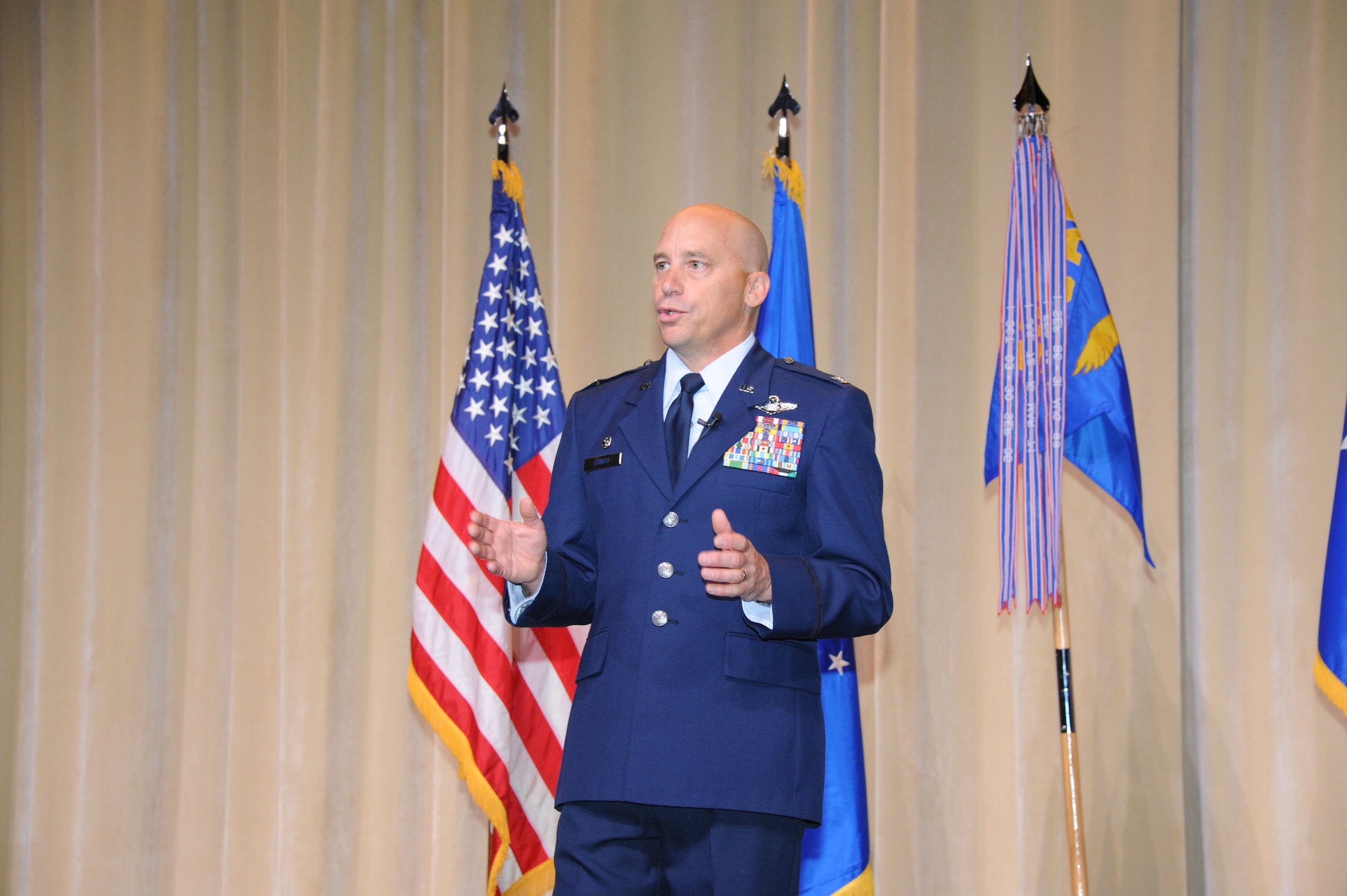 Col. David Condit, Commander, 908th Airlift Wing, gives a short speech about his command philosophy shortly after his change of command ceremony at the Squadron Officer's College, Maxwell Air Force Base, Ala., June 4. The ceremony was presided over by Maj. Gen. Stayce Harris, Commander, 22nd Air Force, Air Force Reserve Command, Dobbins Air Reserve Base, Ga., and the outgoing commander, Col. Adam Willis, now the 445th Airlift Wing, Wright-Patterson Air Force Base, Ohio. (U.S. Air Force photo by Lt. Col. Jerry Lobb)