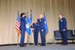 Col. David Condit salutes Maj. Gen. Stayce Harris, Commander, 22nd Air Force, Air Force Reserve Command, stating he is ready to take command of the 908th Airlift Wing during his change of command ceremony held at the Squadron Officer's College, Maxwell Air Force Base, Ala., June 4, while outgoing commander, Col. Adam Willis stands at attention and Command Chief Master Sgt. Tina Carlson holds the unit flag. (U.S. Air Force photo by Lt. Col. Jerry Lobb)