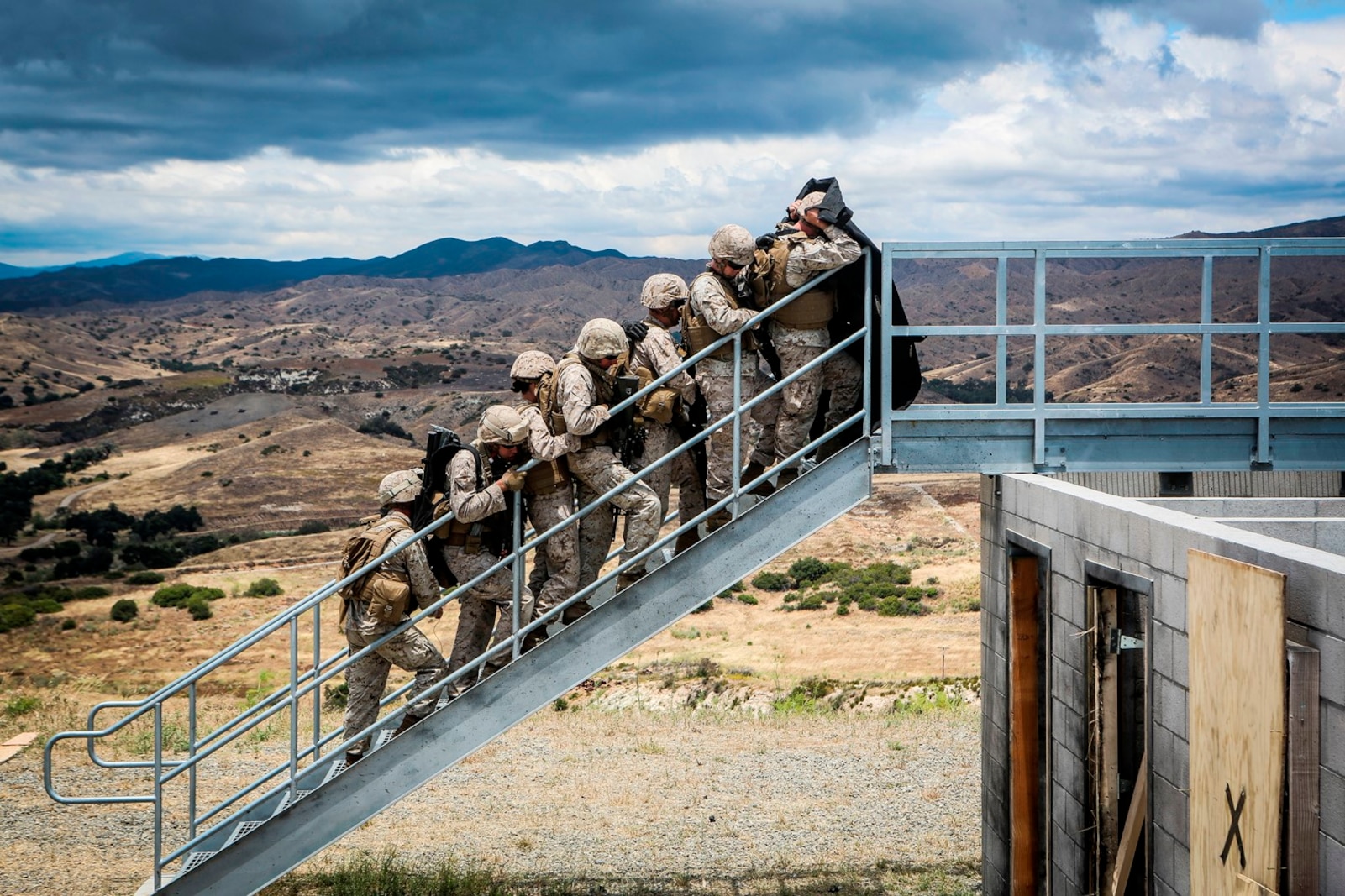 U.S. Marines with the 7th Engineer Support Battalion, 1st Marine Logistics Group, go through mock breaching’s as part of group training. The training includes working with simulated explosives as well as breaching doors and windows on range 211A, Camp Pendleton, Calif., May 25, 2016. (U.S. Marine Corps photo by LCpl. Salmineo Sherman Jr. Combat Camera/released)