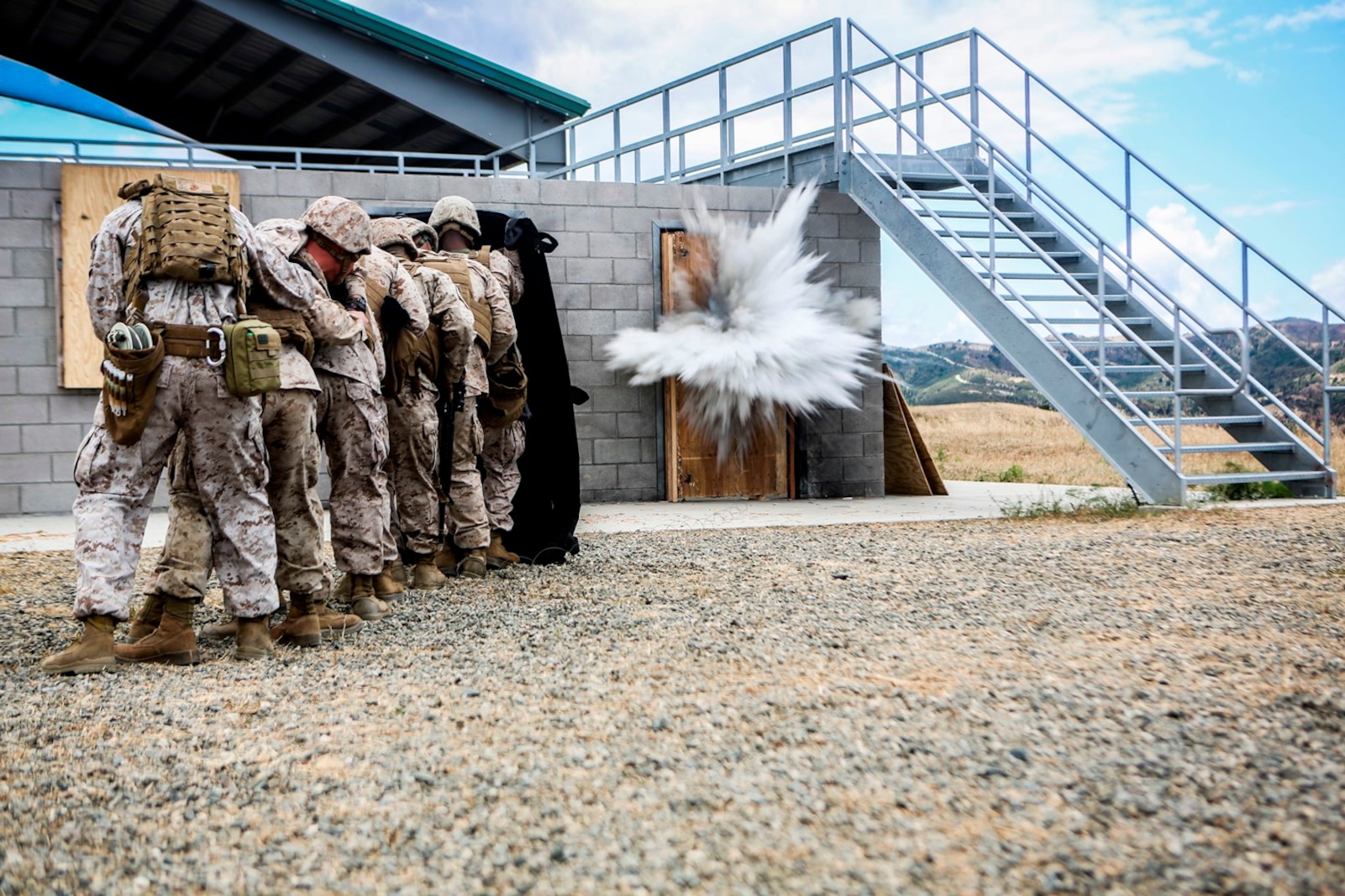 U.S. Marines with the 7th Engineer Support Battalion, 1st Marine Logistics Group, go through mock breaching’s as part of group training. The training includes working with simulated explosives as well as breaching doors and windows on range 211A, Camp Pendleton, Calif., May 25, 2016. (U.S. Marine Corps photo by LCpl. Salmineo Sherman Jr. Combat Camera/released)
