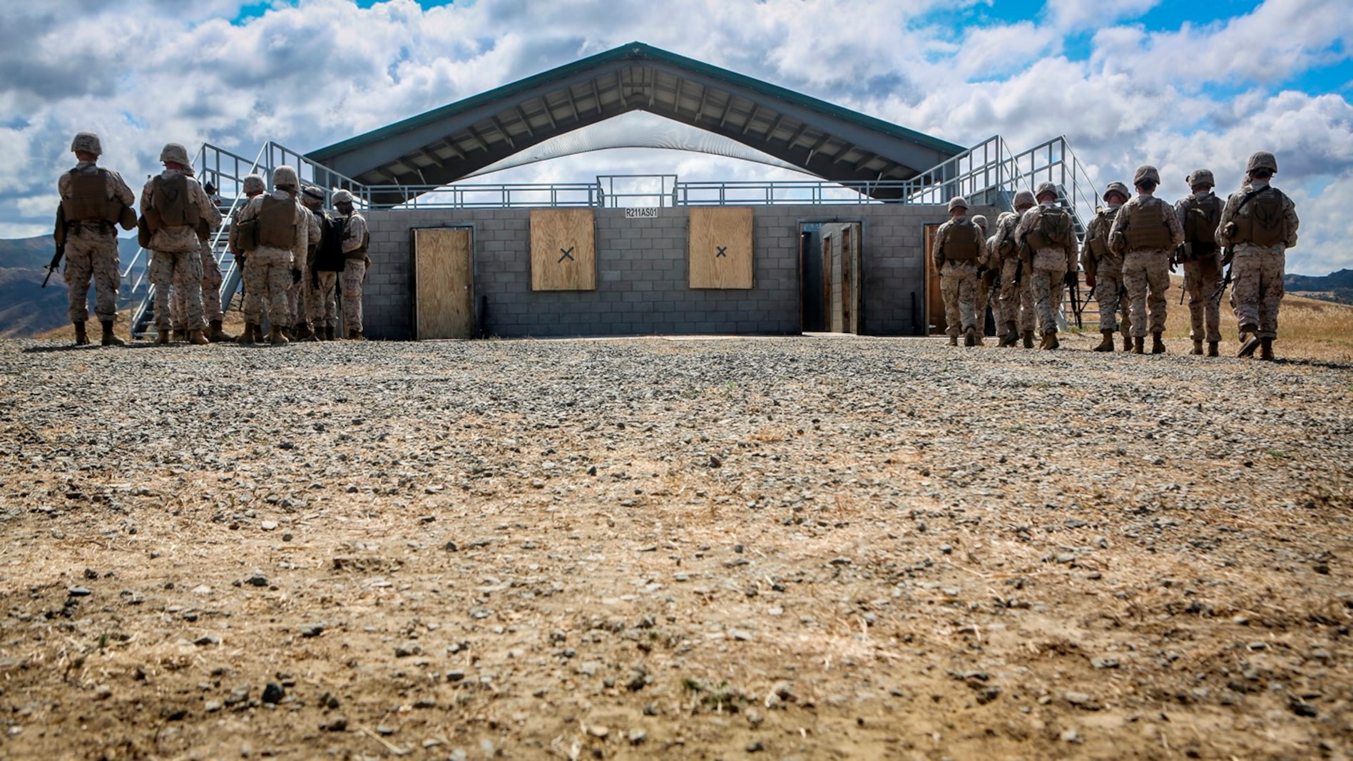 U.S. Marines with the 7th Engineer Support Battalion, 1st Marine Logistics Group, go through mock breaching’s as part of group training. The training includes working with simulated explosives as well as breaching doors and windows on range 211A, Camp Pendleton, Calif., May 25, 2016. (U.S. Marine Corps photo by LCpl. Salmineo Sherman Jr. Combat Camera/released)