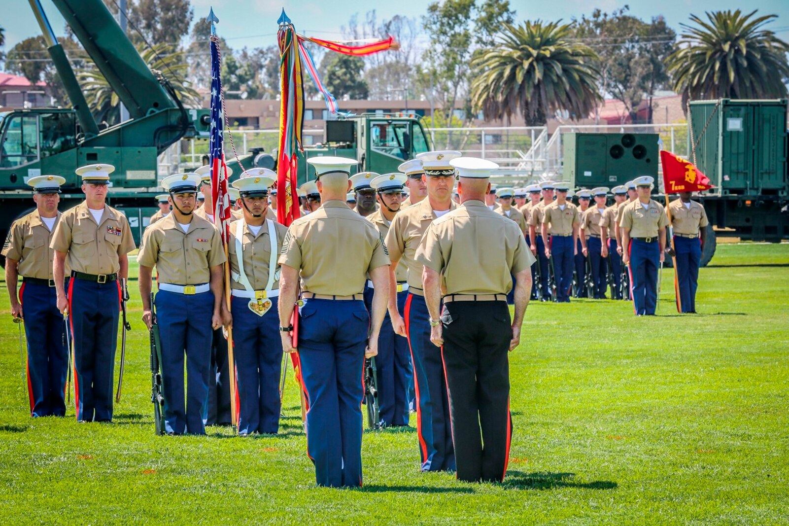 U.S. Marines with the 1st Marine Logistics Group gather for a change of command ceremony in recognition of the 7th Engineer Support Battalion (ESB). The change of command for 7th ESB, May 26th 2016, Camp Pendleton, Calif., represents a military tradition that represents the transfer of authority and responsibility of a unit from one commanding officer to another. (U.S. Marine Corps photo by LCpl. Salmineo Sherman Jr. 1st MLG Combat Camera/released)