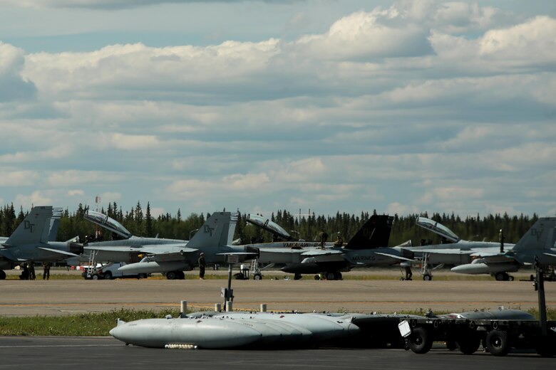 Maintainers from Marine All-Weather Fighter Attack Squadron (VMFA) 242 perform after-flight inspections and repairs to the squadron’s F/A-18D aircraft in preparation for exercise Red Flag-Alaska 16-2 at Eielson Air Force Base, Alaska, June 4, 2016. Exercise Red Flag-Alaska 16-2 provides VMFA-314 and Marine All-Weather Fighter Attack Squadron (VMFA) 242, based out of Marine Corps Station Iwakuni, Japan, the opportunity to train with joint and international units, increasing their combat skills by participating simulated combat situations in a realistic threat environment. (U.S. Marine photo by Lance Cpl. Donato Maffin/Released)