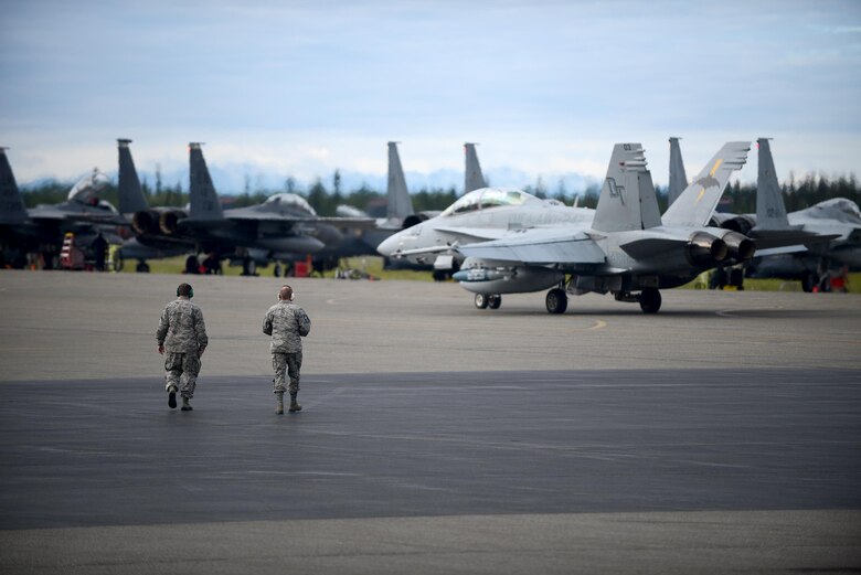 A U.S. Marine Corps F-18 Hornet assigned to Fixed Marine All-Weather Fighter Attack Squadron 242, Marine Corps Air Station Iwakuni, Japan, taxis down the tarmac June 7, 2016, during RED FLAG-Alaska (RF-A) 16-2, at Eielson Air Force Base, Alaska. Eielson serves as a key strategic location for RF-A training and the exercise signifies the United State’s continued commitment to Indo-Asia-Pacific partners. (U.S. Air Force photo by Tech. Sgt. Steven R. Doty)
