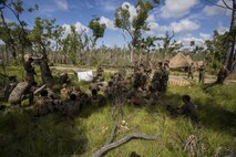 U.S. Marine Corps Capt. Chris Brock, Commanding Officer of Company A, 1st Battalion, 1st Marine Regiment, debriefs the Marines after performing platoon live fire at Shoalwater Bay, Queensland, Australia, May 22, 2016. The platoon-level live fire and maneuver was part of Exercise Southern Jackaroo, a combined training opportunity during Marine Rotational Force – Darwin (MRF-D). MRF-D is a six-month deployment of Marines into Darwin, Australia, where they will conduct exercises and train with the Australian Defence Forces, strengthening the U.S.-Australia alliance. 