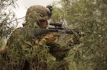 Pfc. Alexander L. Lay, a rifleman, posts security for movements from building to building during Exercise Predator Strike at Cultana Training Area, South Australia, Australia, June 5, 2016. Predator Strike, a yearly exercise taken place in Australia with Marine Rotational Force – Darwin, allows Marines to enhance their skills and train with the Australian Defence Force. Lay, from Fennimore, Wisconsin, is with Company C, 1st Battalion, 1st Marine Regiment, MRF-D.