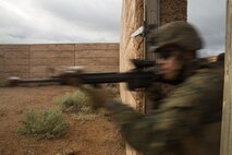 Marines with Company C, 1st Battalion, 1st Marine Regiment, clear a building during Exercise Predator Strike at Cultana Training Area, South Australia, Australia, June 5, 2016. Predator Strike, a yearly exercise taken place in Australia with Marine Rotational Force – Darwin, allows Marines to enhance their skills and train with the Australian Defence Force.
