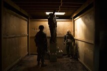 Marines with Company C, 1st Battalion, 1st Marine Regiment, clear a building during Exercise Predator Strike at Cultana Training Area, South Australia, Australia, June 5, 2016. Predator Strike, a yearly exercise taken place in Australia with Marine Rotational Force – Darwin, allows Marines to enhance their skills and train with the Australian Defence Force.