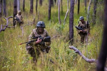 U.S. Marines with 1st Battalion, 1st Marine Regiment and members of the Australian Army with Battle Group Waratah, 8th Brigade, travel to their defensive position during Exercise Southern Jackaroo at Shoalwater Bay, Queensland, Australia, May 18, 2016. Conducting defensive training allows U.S. Marines and Australian service members to share techniques, tactics and procedures to improve their defensive skills during Marine Rotational Force – Darwin (MRF-D). MRF-D is a six-month deployment of Marines into Darwin, Australia, where they will conduct exercises and train with the Australian Defence Forces, strengthening the U.S.-Australia alliance.