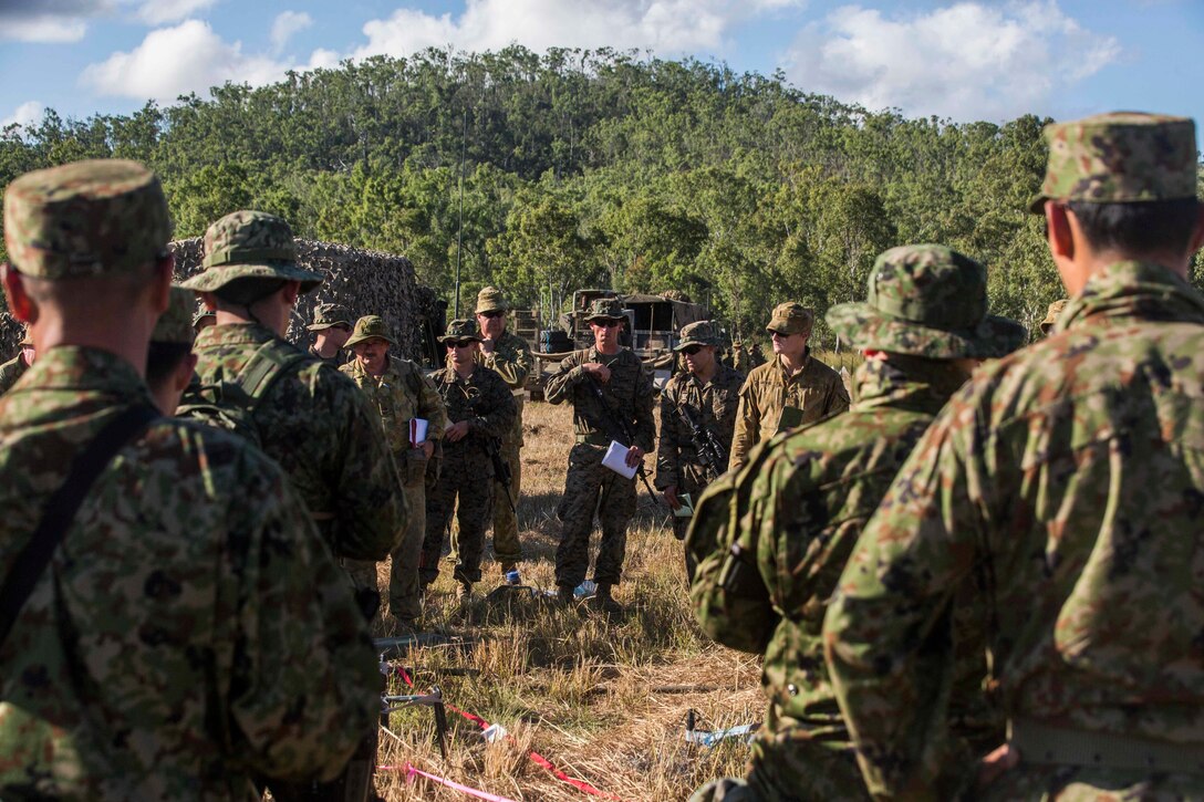 U.S. Marines with 1st Battalion, 1st Marine Regiment, members of the Australian Army with Battle Group Waratah, 8th Brigade, and members of the Japan Ground Self-Defense Force discuss future plans for Exercise Southern Jackaroo at Shoalwater Bay, Queensland, Australia, May 18, 2016. Exercise Southern Jackaroo is a combined training opportunity during Marine Rotational Force – Darwin (MRF-D). MRF-D is a six-month deployment of Marines into Darwin, Australia, where they will conduct exercises and train with the Australian Defence Forces, strengthening the U.S.-Australia alliance.