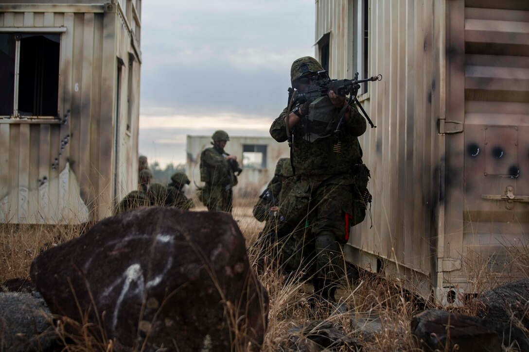 Members of the Japan Ground Self-Defense Force engage in urban warfare training at Shoalwater Bay, Queensland, Australia, May 24, 2016. The urban warfare training, part of Exercise Southern Jackaroo, allowed combined military forces to train, teach, and learn from each other in an urban environment during Marine Rotational Force – Darwin (MRF-D). MRF-D is a six-month deployment of Marines into Darwin, Australia, where they will conduct exercises and train with the Australian Defence Forces, strengthening the U.S.-Australia alliance.