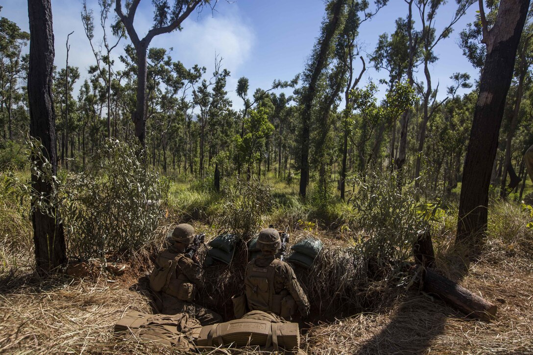 U.S. Marines with 1st Battalion, 1st Marine Regiment, defend their position after a simulated attack at Shoalwater Bay, Queensland, Australia, May 29, 2016. The simulated attack, part of Exercise Southern Jackaroo, increased proficiency in defensive actions against an oncoming enemy force during Marine Rotational Force – Darwin (MRF-D). MRF-D is a six-month deployment of Marines into Darwin, Australia, where they will conduct exercises and train with the Australian Defence Forces, strengthening the U.S.-Australia alliance.