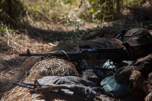 A U.S. Marine prepares to engage a target with M240B medium machine gun during a simulated attack at Shoalwater Bay, Queensland, Australia, May 29, 2016. The simulated attack, part of Exercise Southern Jackaroo, increased proficiency in defensive actions against an oncoming enemy force during Marine Rotational Force – Darwin (MRF-D). MRF-D is a six-month deployment of Marines into Darwin, Australia, where they will conduct exercises and train with the Australian Defence Forces, strengthening the U.S.-Australia alliance. The Marines are with 1st Battalion, 1st Marine Regiment, MRF-D.