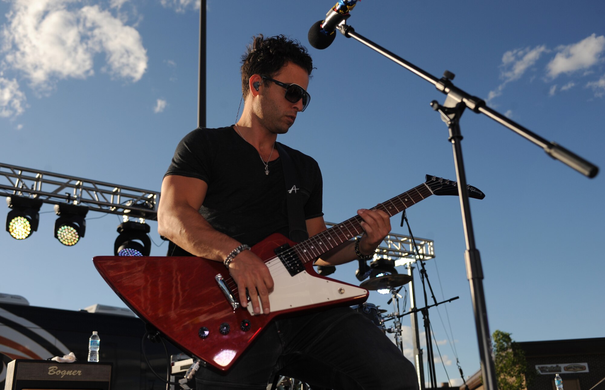 Andy Skib, guitarist for David Cook, plays guitar during a free concert outside the Dakota’s Club at Ellsworth Air Force Base, S.D., June 3, 2016. The concert was sponsored by the Air Force Services Activity’s entertainment program. (U.S. Air Force photo by Airman 1st Class Denise M. Nevins/Released)