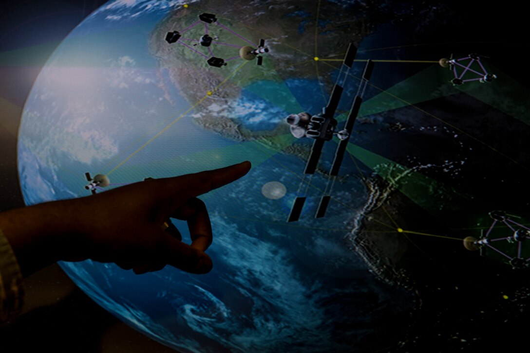 U.S. Air Force Technical Sgt. Robert, target system analyst assigned to the 15th Intelligence Squadron, 363rd Intelligence, Surveillance and Reconnaissance Group, 363rd ISR Wing provides training using a simulated satellite constellation at Langley Air Force Base, Va., May 24, 2016. The 363rd Intelligence, Surveillance and Reconnaissance Wing brings analysis, targeting, and ISR support to special operations forces, focusing on the needs of the tactical and operational warfighter. (U.S. Air Force photo by Airman 1st Class Derek Seifert) 