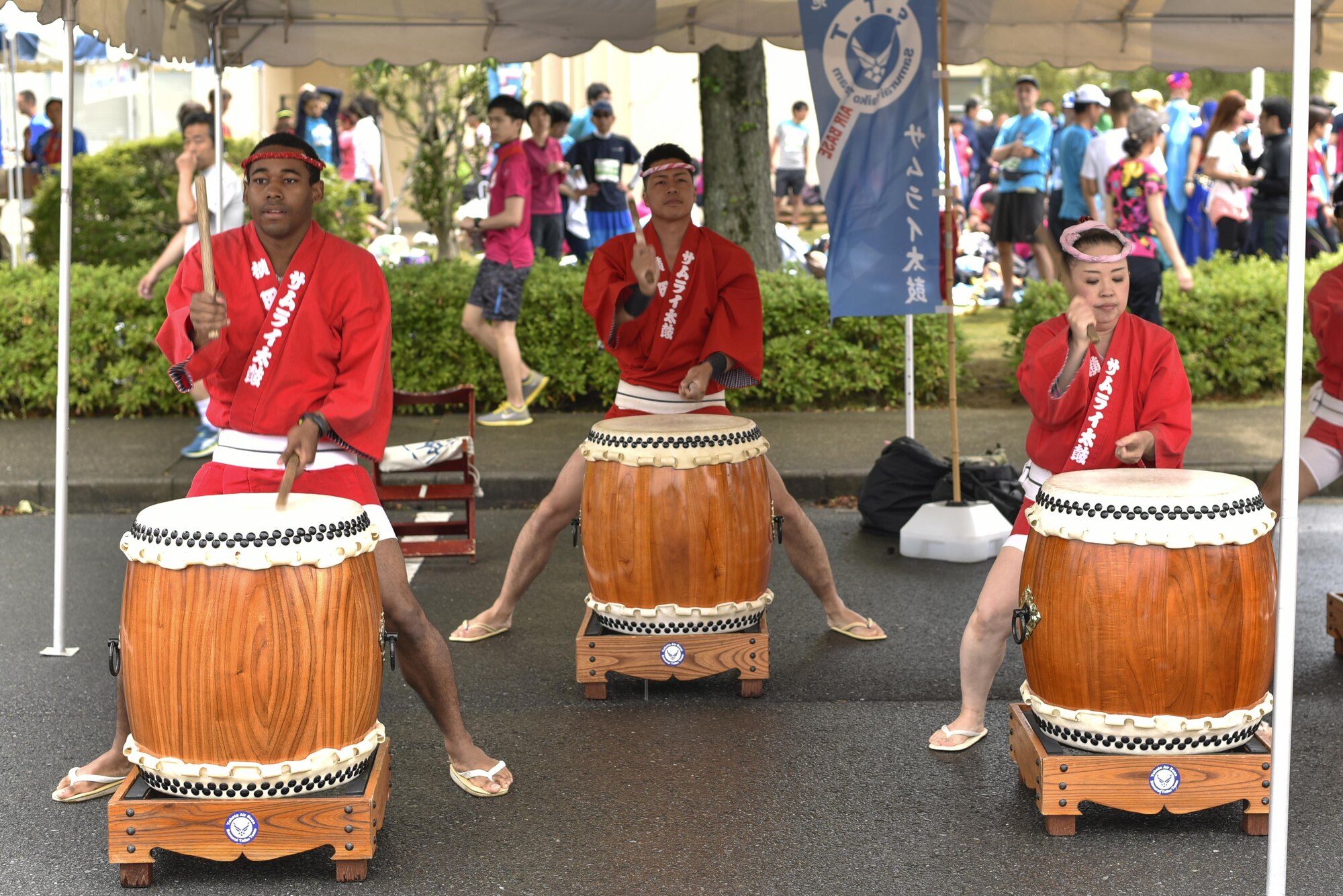 Yokota Taiko Drummers perform at the 2016 Ekiden Run at Yokota Air Base, Japan, June 5, 2016. Along with the Taiko drummers, the Ekiden Run also had a Zumba performance, merchandise stands and food venders. (U.S. Air Force photo by Staff Sgt. Michael Washburn/Released)
