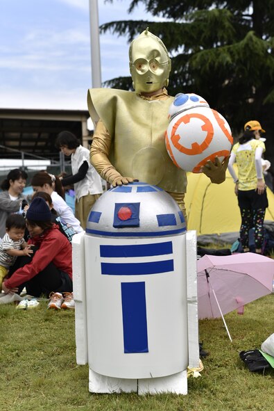 A Japanese runner is dressed as C-3PO during the 2016 Ekiden Run at Yokota Air Base, Japan, June 5, 2016. Japanese runners came to Yokota to participate in the run, many of them in costumes. (U.S. Air Force photo by Staff Sgt. Michael Washburn/Released)