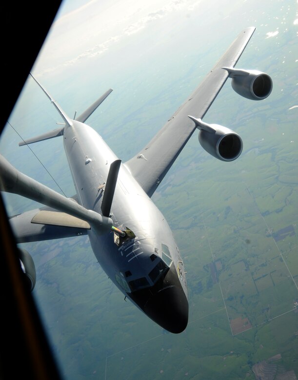 A KC-135 Stratotanker assigned to McConnell Air Force Base, Kan., receives fuel from another KC-135 during a training sortie, June 3, 2016, over Kansas. Aircrews regularly train together to ensure they’re proficient when they perform aerial refueling. (U.S. Air Force photo/Staff Sgt. Rachel Waller)