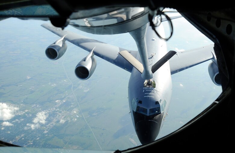 A KC-135 Stratotanker offloads fuel to another KC-135, June 3, 2016, over Kansas. Both aircraft are assigned to McConnell Air Force Base, Kan., and train together regularly. (U.S. Air Force photo/Staff Sgt. Rachel Waller)