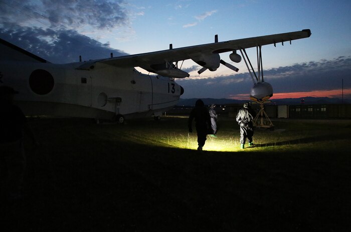 U.S. Marines from 3rd Marine Division, Chemical, Biological, Radiological and Nuclear defense platoon, Headquarters Battalion, III Marine Expeditionary Force, test for chemical hazards at a simulated airplane crash site during exercise Habu Sentinel 16 at Marine Corps Air Station Iwakuni, Japan, June 3, 2016. As the annual capstone exercise for the division’s response element, this event encompasses multiple objectives specific to CBRN response and validates unit standard operating procedures in an unfamiliar training environment. (U.S. Marine Corps photo by Sgt. Jessica Quezada/Released)