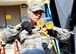 Staff Sgt. Elvis Pabon, 8th Civil Engineer Squadron Heating, Ventilation, and Air Conditioning journeyman, checks for leaks in an air refrigerating machine at the base theater June 7, 2016. The Wolf Pack relies on the individuals from the HVAC shop to help keep the mission going. (U.S. Air Force photo/Staff Sgt. Chelsea Browning)