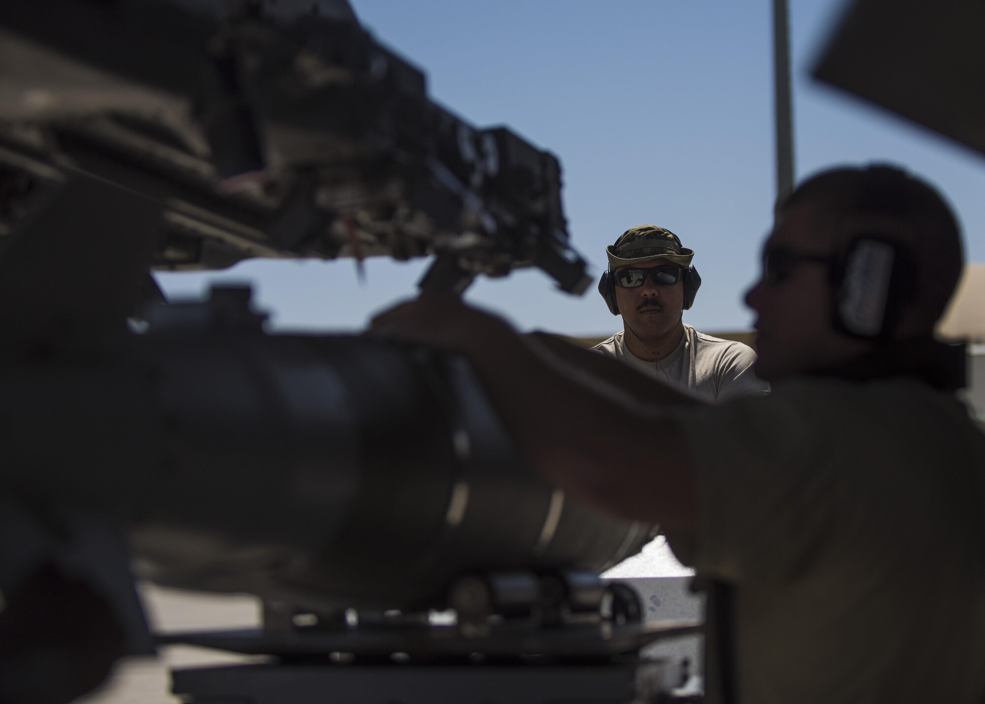 Senior Airman Jorge Martinez (left) and Technical Sgt. Joseph McCullough (right), 455th Expeditionary Aircraft Maintenance Squadron weapons maintainers, load a GBU (Guided Bomb Unit)-54 on an F-16C Fighting Falcon during routine weapons upload at Bagram Airfield, Afghanistan, June 07, 2016. The weapons team performs a critical role for the close air support mission, ensuring Fighting Falcon pilots have the correct and functional munitions to provide the air cover ground forces need. (U.S. Air Force photo by Senior Airman Justyn M. Freeman)