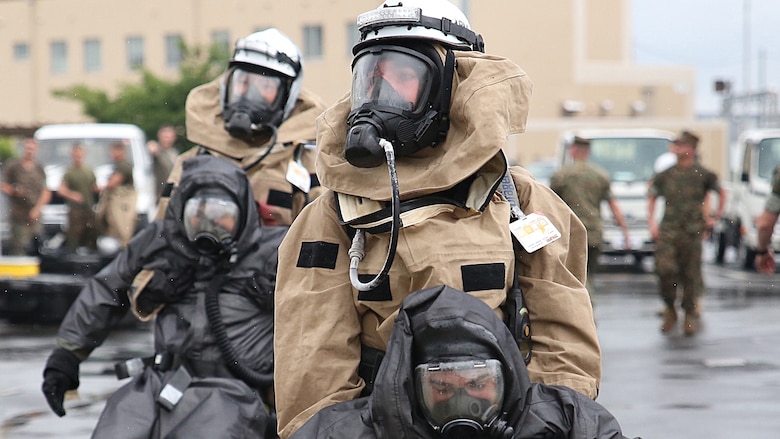 U.S. Marines from 3rd Marine Division, Chemical, Biological, Radiological and Nuclear defense platoon, Headquarters Battalion, III Marine Expeditionary Force, evacuate simulated casualties during exercise Habu Sentinel 16 at Disaster Village, Marine Corps Air Station Iwakuni, Japan, June 7, 2016. As the annual capstone exercise for the division’s response element, this event encompasses multiple objectives specific to CBRN response and validates unit standard operating procedures in an unfamiliar training environment.