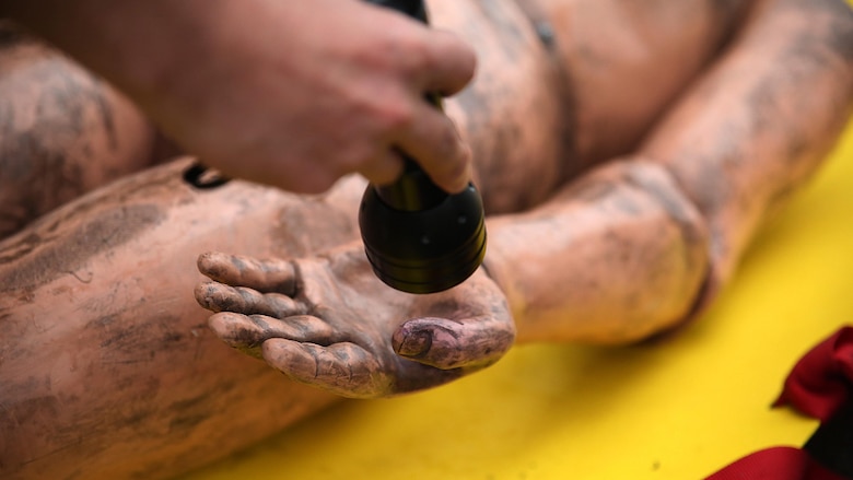 Simulated casualties are screened for chemicals after decontamination during exercise Habu Sentinel 16 at Disaster Village, Marine Corps Air Station Iwakuni, Japan, June 6, 2016. As the annual capstone exercise for the 3rd Marine Division, Chemical, Biological, Radiological and Nuclear defense platoon, Headquarters Battalion, III Marine Expeditionary Force, response element, this event encompasses multiple objectives specific to CBRN response and validates unit standard operating procedures in an unfamiliar training environment. 