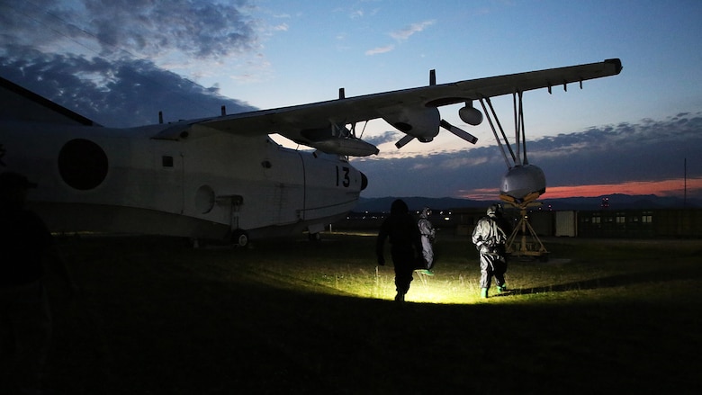 U.S. Marines from 3rd Marine Division, Chemical, Biological, Radiological and Nuclear defense platoon, Headquarters Battalion, III Marine Expeditionary Force, test for chemical hazards at a simulated airplane crash site during exercise Habu Sentinel 16 at Marine Corps Air Station Iwakuni, Japan, June 3, 2016. As the annual capstone exercise for the division’s response element, this event encompasses multiple objectives specific to CBRN response and validates unit standard operating procedures in an unfamiliar training environment.