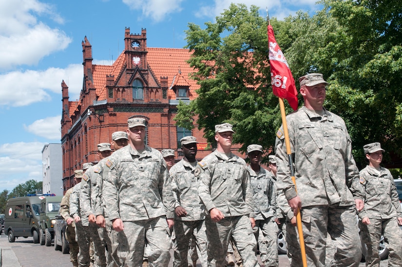 Soldiers of the 361st Engineer Company from Warner Robins, Ga., march along with soldiers from Poland, Macedonia, the U.K., Bulgaria, Germany and the Netherlands through the streets of Chelmno, Poland, as part of the opening ceremony of Exercise Anakonda 2016, a multi-national training event geared to enhance alliance interoperability and readiness.