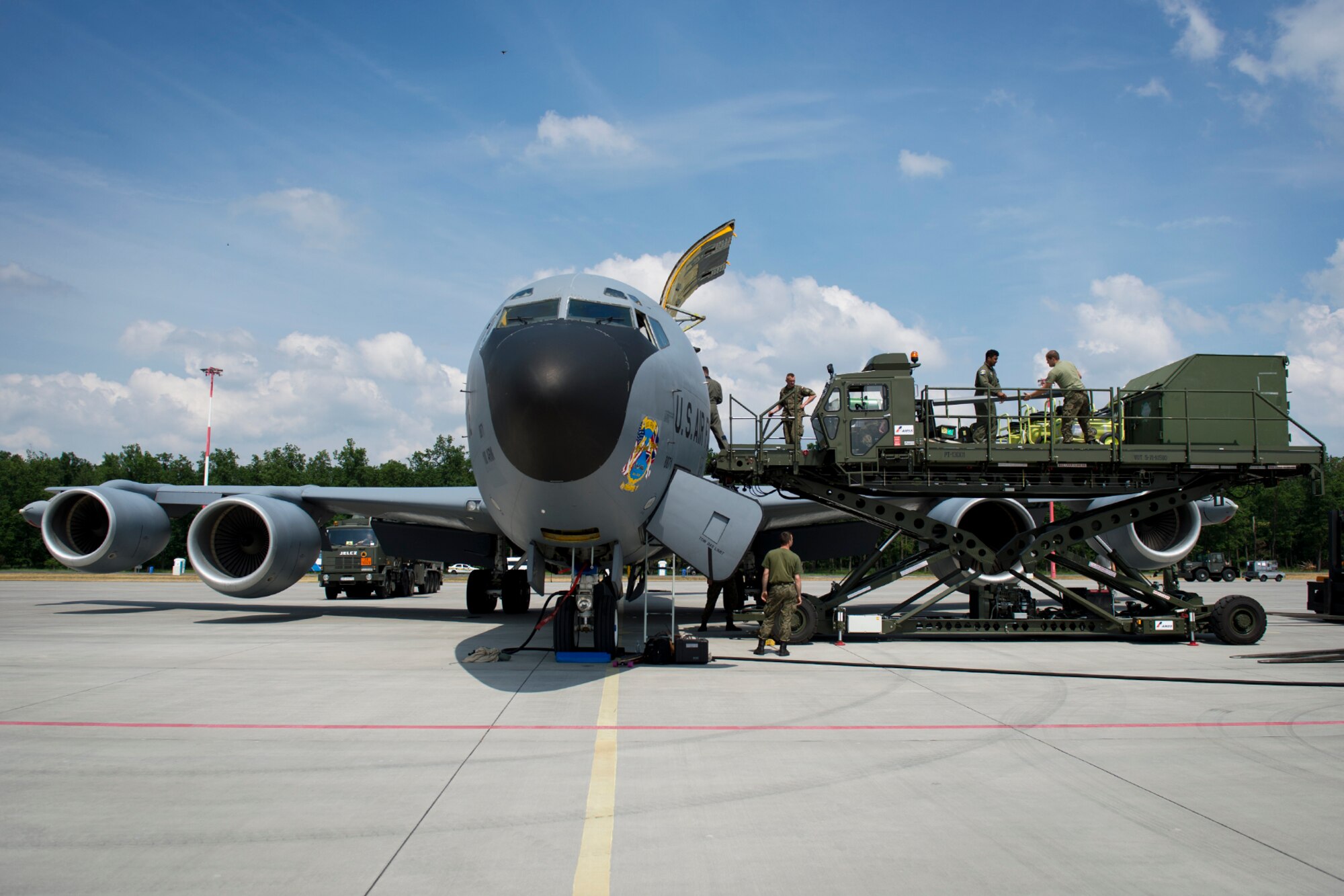 U.S. Air Force and Polish air force service members unload a KC-135 from the 100th Air Refueling Wing, England, in preparation for exercise Baltic Operations 2016 at Powidz Air Base, Poland, June 2, 2016. BALTOPS 2016, scheduled for June 3-19, 2016 in Estonia, Finland, Germany, Sweden, Poland, and throughout the Baltic Sea, is a joint, multinational, maritime-focused exercise designed to enhance flexibility and interoperability, as well as demonstrate resolve among NATO and partner forces to defend the Baltic region. The exercise will involve maritime, ground, and air forces to strengthen combined response capabilities necessary to ensure regional stability. (U.S. Air Force photo by Senior Airman Erin Babis/Released)
