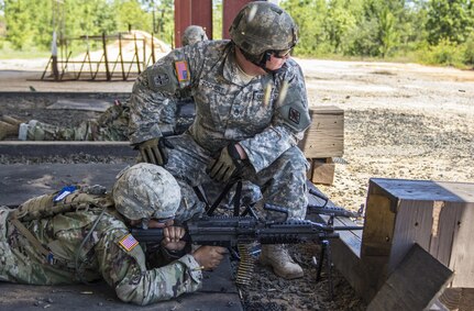 A Soldier in his 6th week of Basic Combat Training with Co. A, 3rd Bn., 39th Inf. Reg., fires the M249 Light Machine Gun at targets downrange on the U.S. Weapons Demonstration range at Fort Jackson, S.C., June 8. (U.S. Army photo by Sgt. 1st Class Brian Hamilton/ released)