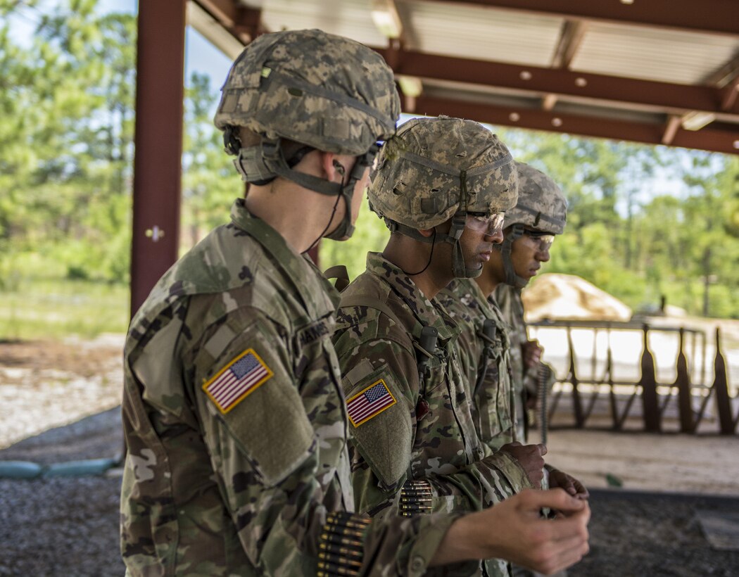 Soldiers in their 6th week of Basic Combat Training with Co. A, 3rd Bn., 39th Inf. Reg., wait at the ready line before firing the M249 Light Machine Gun at the U.S. Weapons Demonstration range at Fort Jackson, S.C., June 8. (U.S. Army photo by Sgt. 1st Class Brian Hamilton/ released)