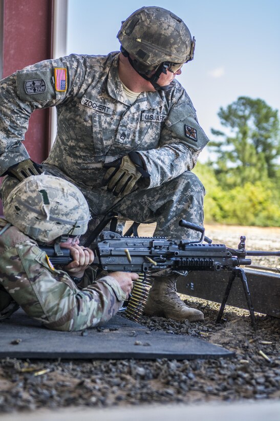 A Soldier in his 6th week of Basic Combat Training with Co. A, 3rd Bn., 39th Inf. Reg., fires the M249 Light Machine Gun at targets downrange on the U.S. Weapons Demonstration range at Fort Jackson, S.C., June 8. (U.S. Army photo by Sgt. 1st Class Brian Hamilton/ released)