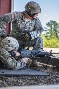 A Soldier in his 6th week of Basic Combat Training with Co. A, 3rd Bn., 39th Inf. Reg., fires the M249 Light Machine Gun at targets downrange on the U.S. Weapons Demonstration range at Fort Jackson, S.C., June 8. (U.S. Army photo by Sgt. 1st Class Brian Hamilton/ released)